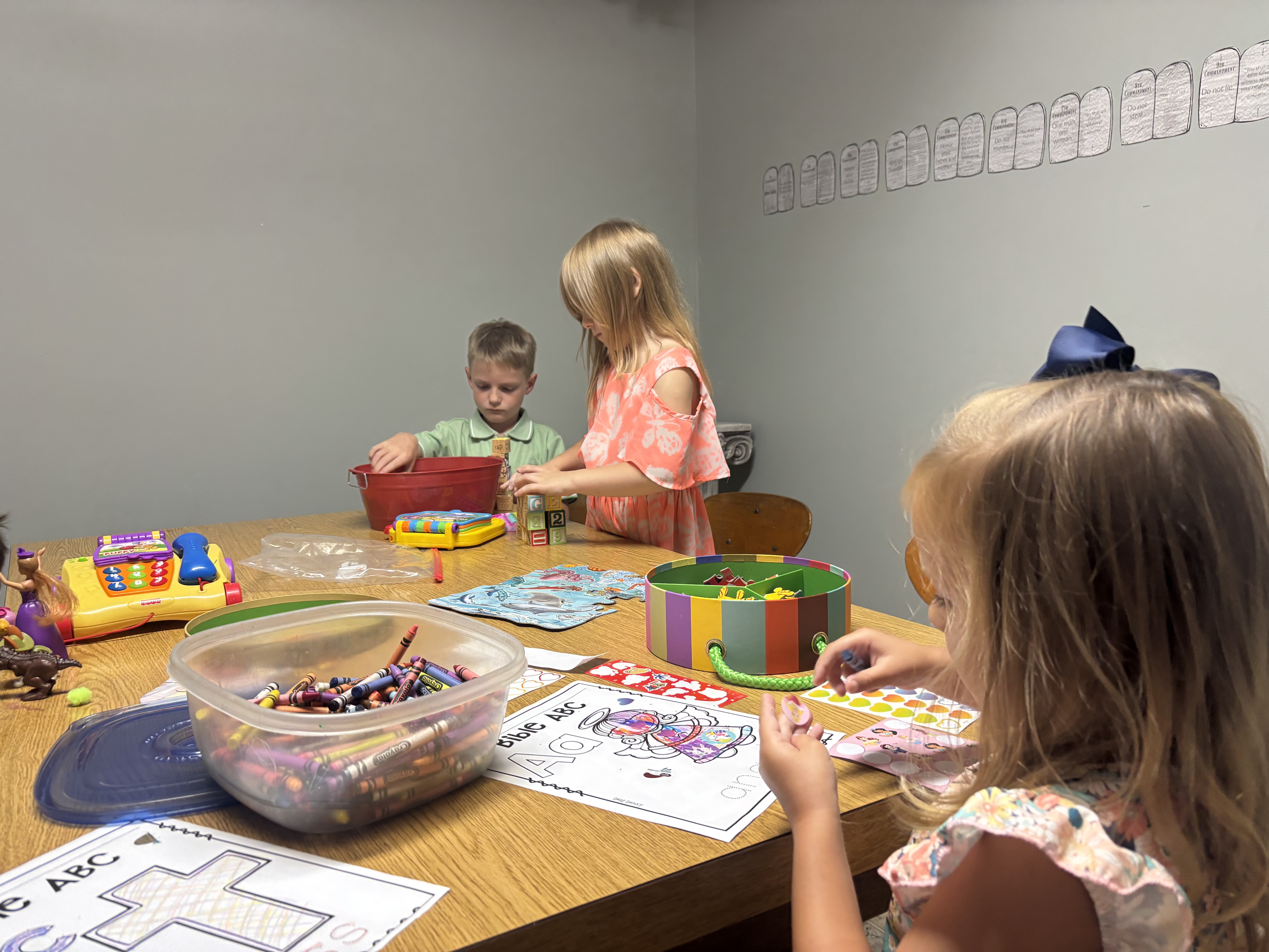 Children participating in a Bible activity during Children’s Church